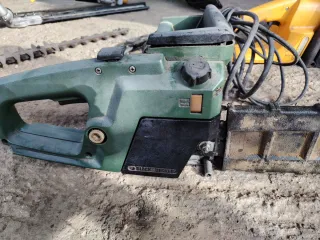 Motosierra Naranja y Negra.. Gasolina y eléctricas