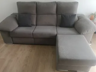 Sofá cama gris tela anti manchas.