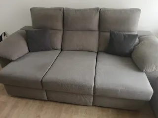 Sofá cama gris tela anti manchas.