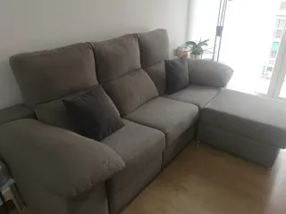 Sofá cama gris tela anti manchas.