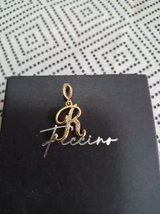 Colgante letra R con circonitas oro