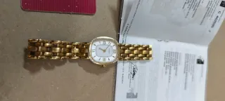Reloj Titan Oro y Diamantes