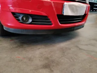 Goma inferior defensa Opel Astra H