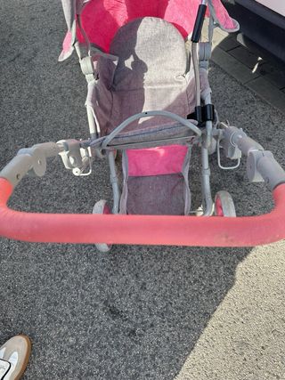 Carro de bebé rosa y gris