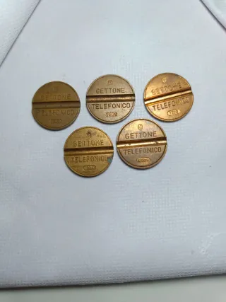 5 gettoni telefonici: 7506, 7601, 7710, 7906, 8003