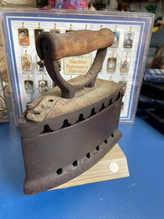 Plancha de carbón antigua