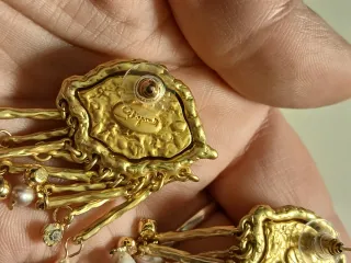 Orecchini pendenti occhio dorati