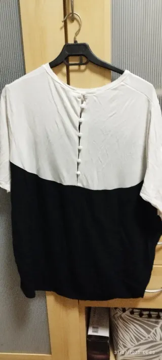 Blusa bicolor negra y blanca