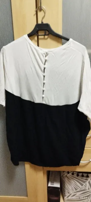 Blusa bicolor negra y blanca