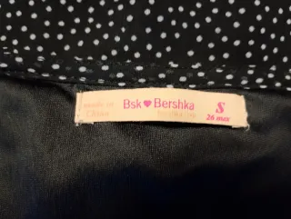 Vestido negro con lunares blancos