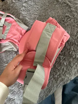 Mochila portabebés rosa