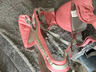 Mochila portabebés rosa