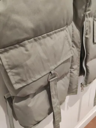 Chaleco acolchado verde agua.