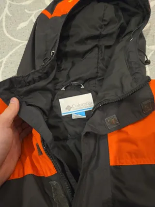 Chaqueta Columbia gris y naranja