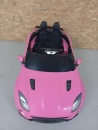 Coche eléctrico Jaguar rosa para niños