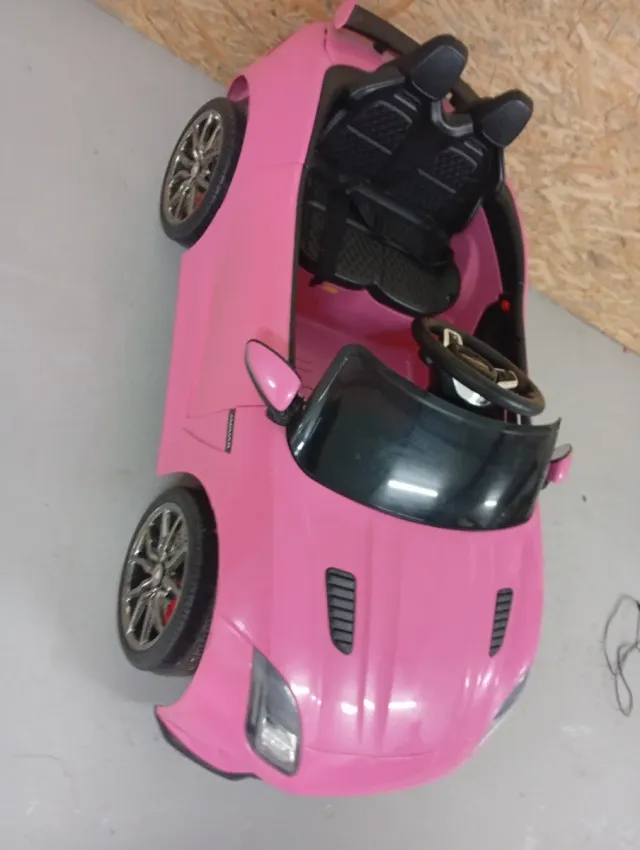 Coche eléctrico Jaguar rosa para niños