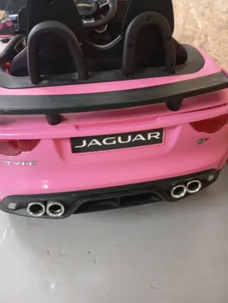 Coche eléctrico Jaguar rosa para niños
