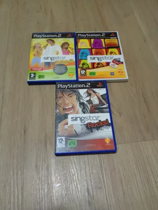 Lote Singstar PS2: 3 Giochi e 2 Microfoni