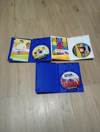 Lote Singstar PS2: 3 Giochi e 2 Microfoni