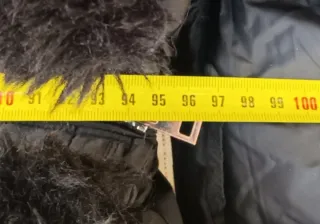 Plumas chaqueta larga negra mujer