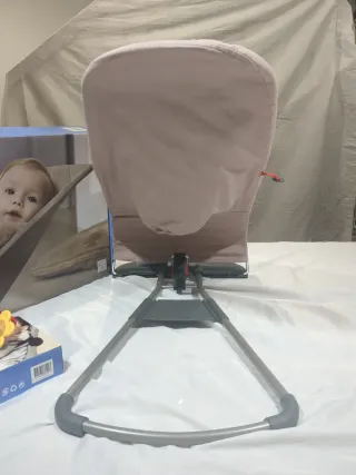 Hamaca bebé BabyBjörn rosa + accesorio entreten.