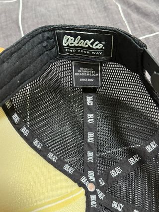 Gorra Oblack Negra y Amarilla SOLO ENVIO