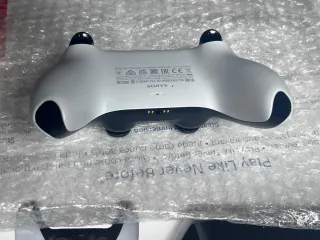 Mando DualSense y juego