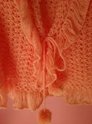 Poncho artesanal rosa