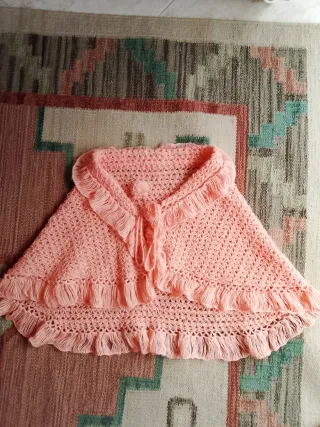 Poncho artesanal rosa