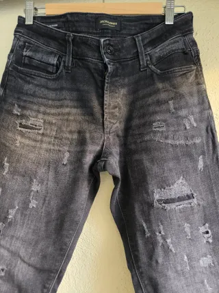 Vaqueros negros hombre desgastados