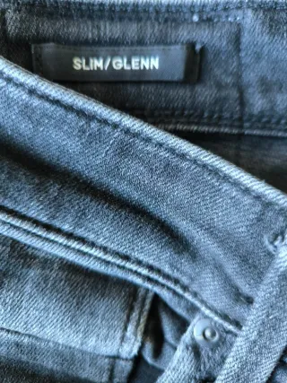 Vaqueros negros hombre desgastados