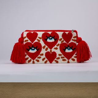 Bolso de mano bordado a mano con ojos y corazones