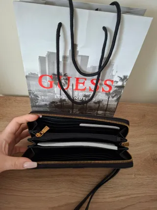 Portafoglio Guess nero con zip e polsino