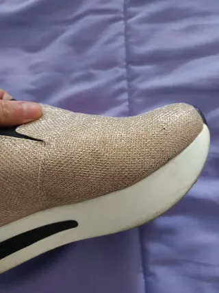 Zapatillas doradas mujer