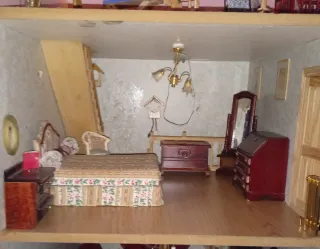 Casita de muñecas de ladrillo naranja