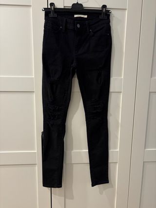 Jeans neri strappati donna