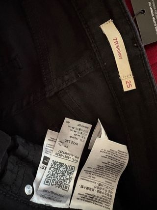 Jeans neri strappati donna