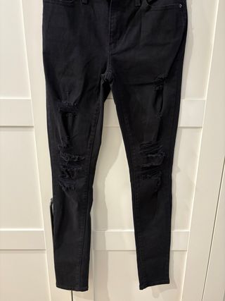 Jeans neri strappati donna