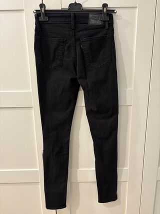 Jeans neri strappati donna