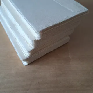 Papel artesanal cosido para libro