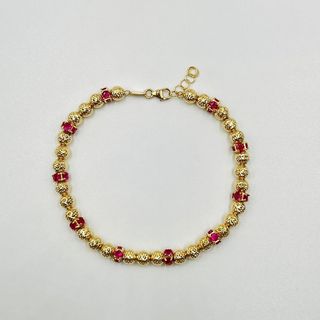 PULSERA BOLAS DIAMANTADAS Y PIEDRAS ROJAS. Oro 18k