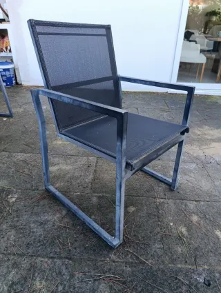 Conjunto mesa de cristal y 6 sillas para exterior