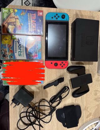 Nintendo Switch + 2 Giochi + Accessori