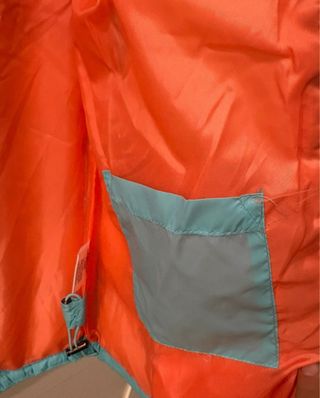 Piumino donna blu e arancione