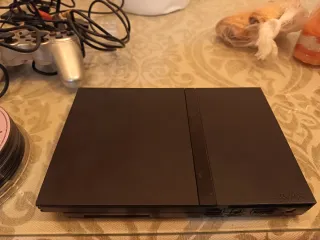 PlayStation 2 en perfecto estado + mandos+ juegos