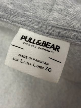 Sudadera gris con cremallera