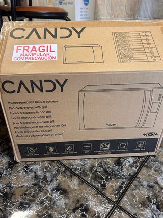 Microondas Candy Nuevo sin usar