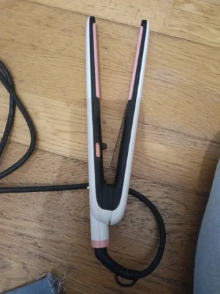 Plancha de pelo rosa y blanca