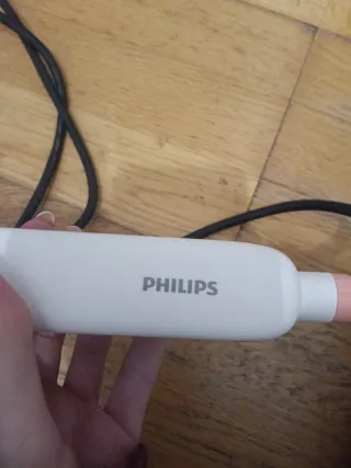 Plancha de pelo rosa y blanca