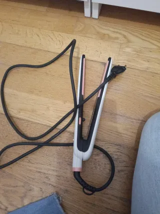 Plancha de pelo rosa y blanca